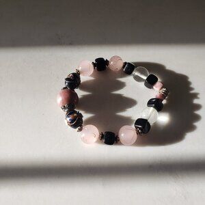 Purple, pink and black elastic beaded bracelet